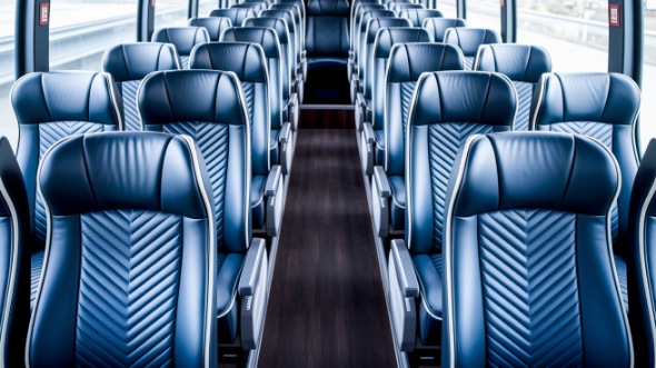 56 passenger charter bus rental troy